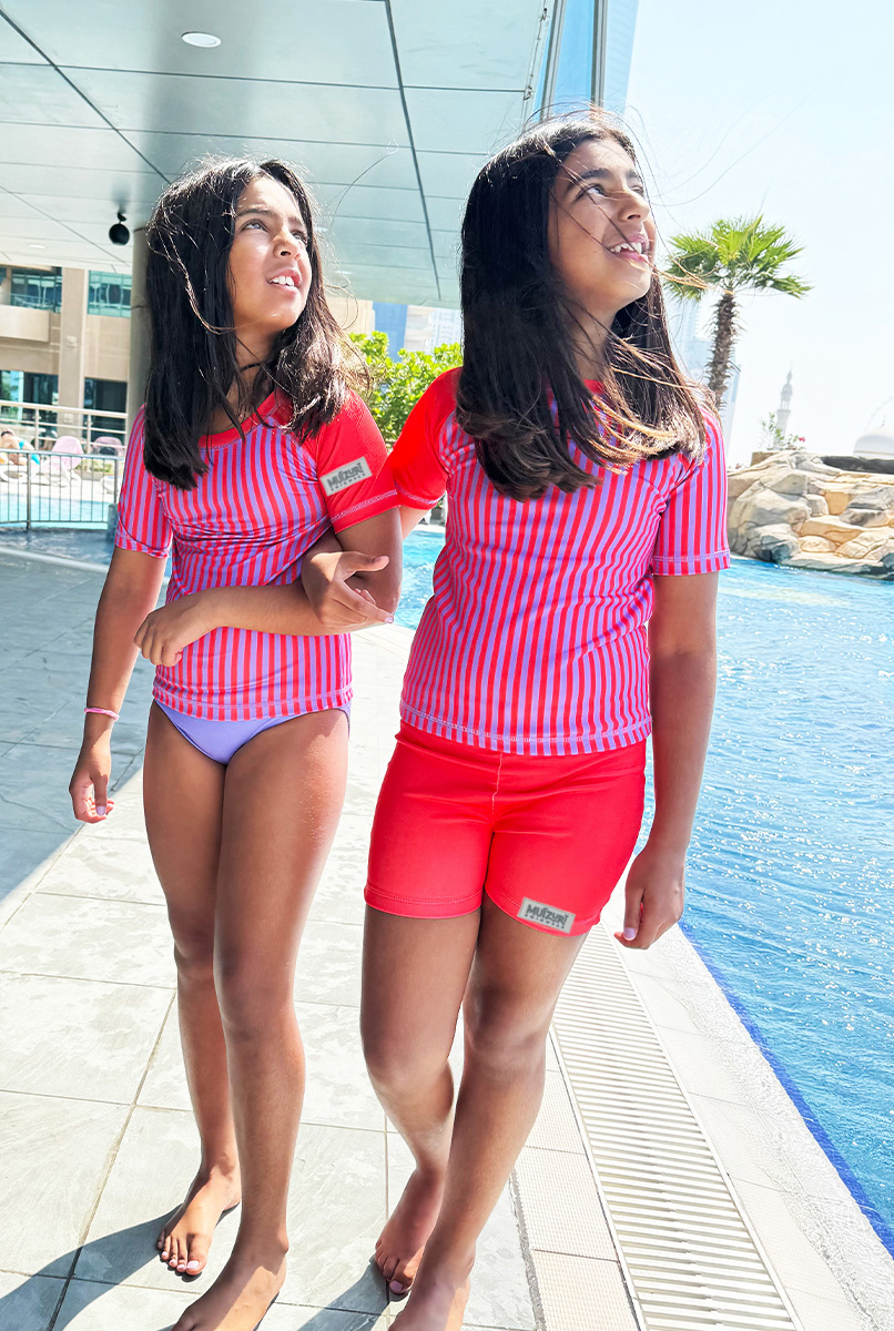 Girls Swimwear, Girls Costume, Girls Swimming Costume, Buy Girls Swimwear, Buy Girls Swimming Costume, Red swimming custume, Purple swimming costume, Red & Purple swimming costume, Stripe design costume